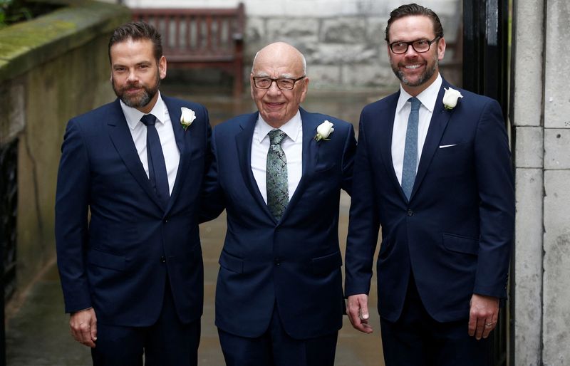 Rupert Murdoch flanked by sons Lachlan and James arriving at St Bride's church in London in March 2016