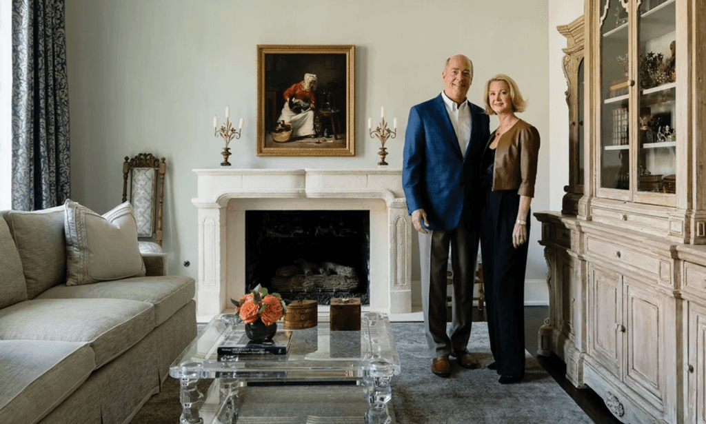 Cary McNair and his wife posing together at a Houston social event