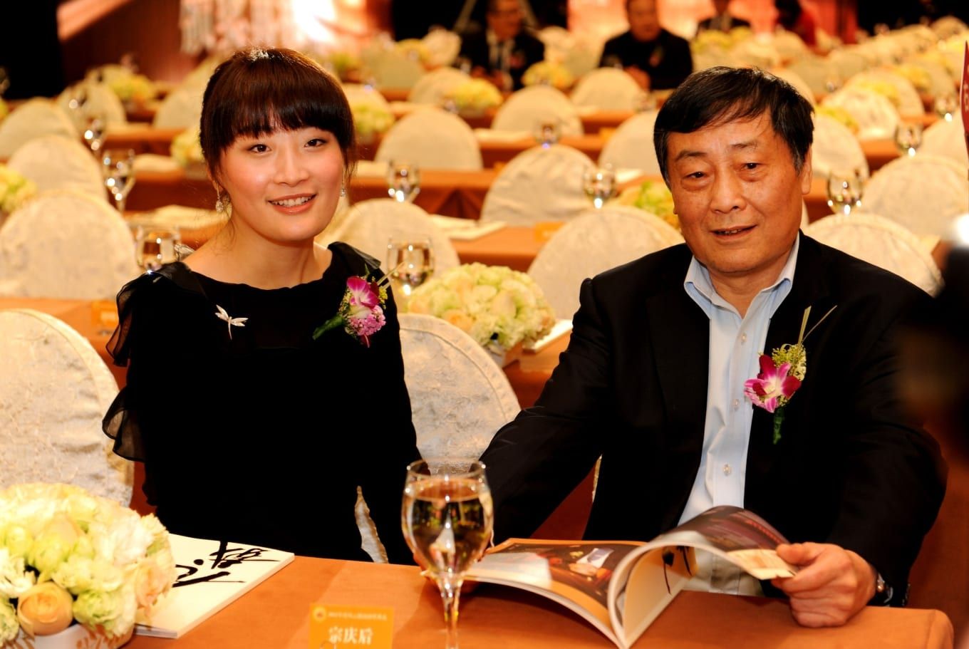 Kelly Zong with her father Zong Qinghou, founder of Wahaha Group, at a formal event